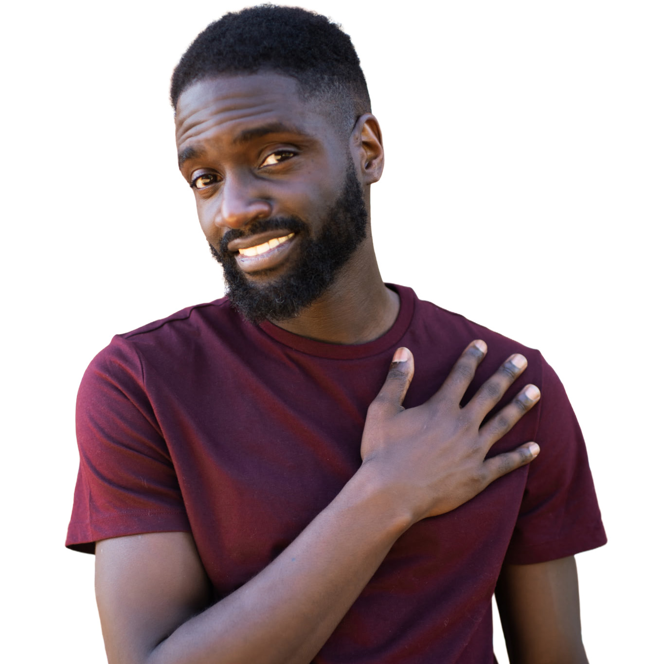 Dance in the Dark™: Groove to Give Festival Tboy, Groove to Give Festival instructor, smiling with one hand over his chest, wearing a burgundy shirt.