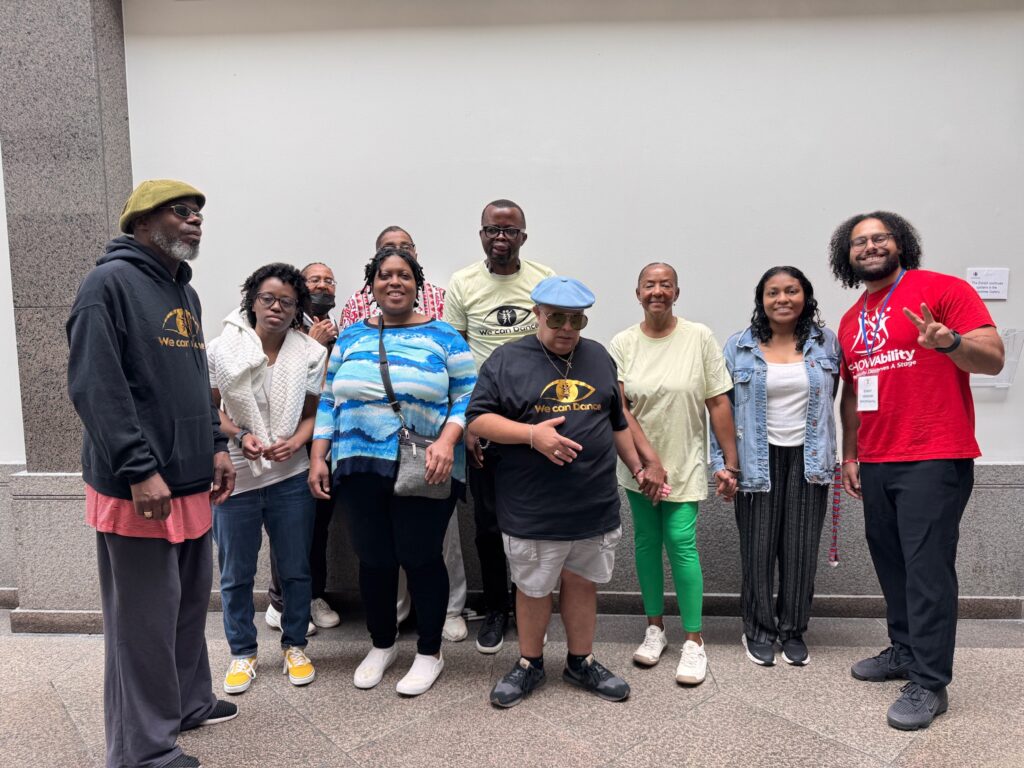 We Can Dance participants and community members posing together for a group photo at the ADA 36 celebration.